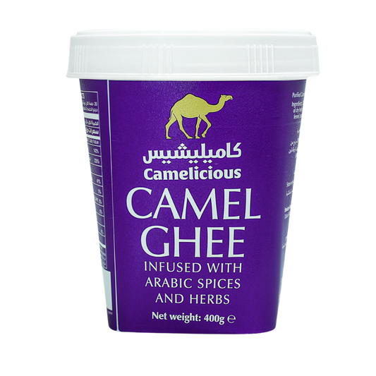 Camelicious Camel Ghee 400g container labeled 'For Export Only'. The purple packaging reads 'Infused with Arabic Spices and Herbs' and features the Camelicious logo with a gold camel icon and white text.