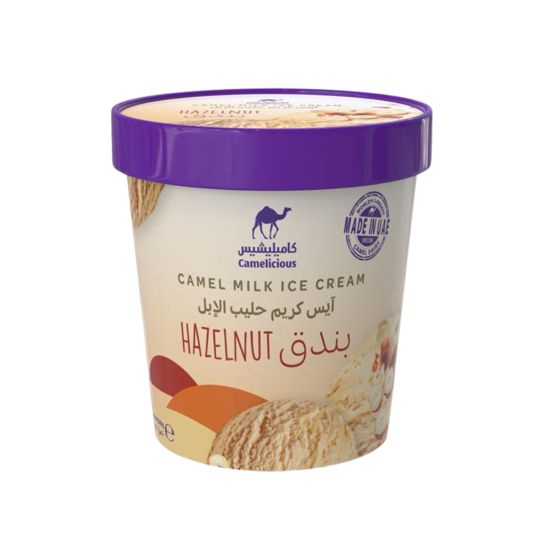 Camelicious Hazelnut Camel Milk Ice Cream 400ml tub with purple lid, showing hazelnut and ice cream scoop illustration on the front label.